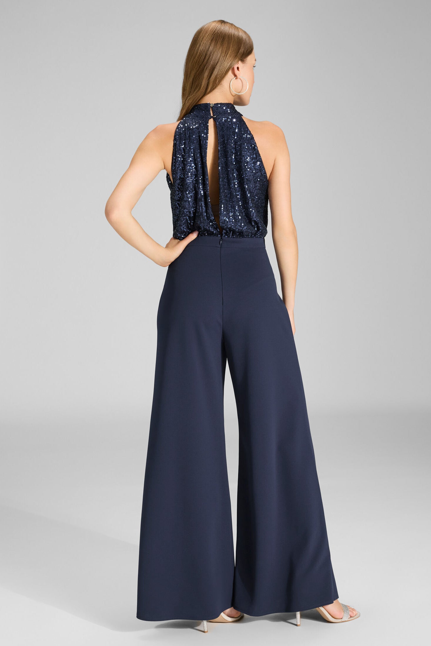 Ärmelloser Jumpsuit mit Schluppenblusen Top aus elastischer Paillette