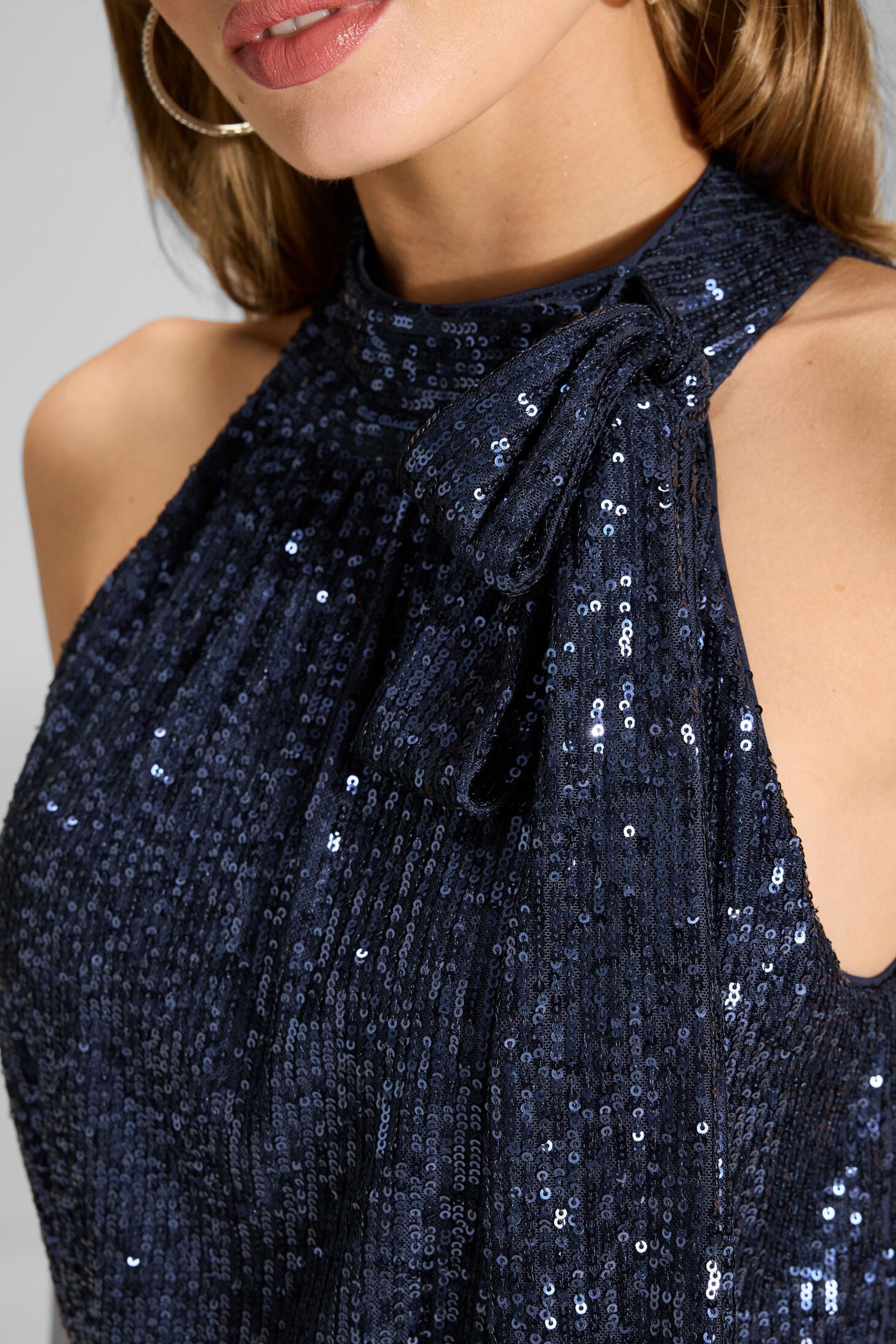 Ärmelloser Jumpsuit mit Schluppenblusen Top aus elastischer Paillette