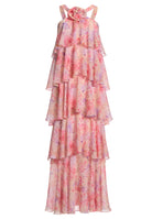 Abendkleid aus bedrucktem Chiffon mit gestuften Volants und Stoffblüte