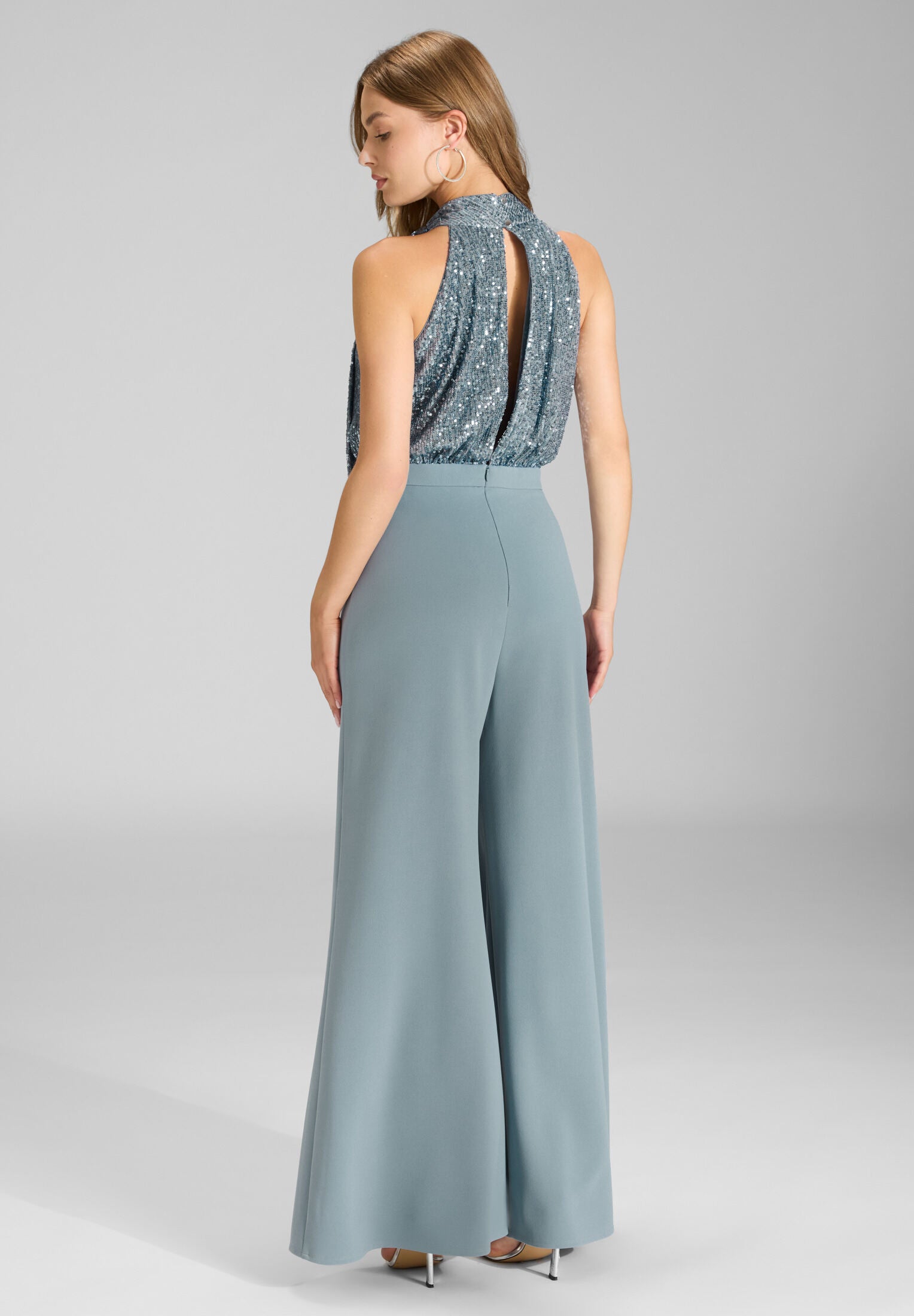 Ärmelloser Jumpsuit mit Schluppenblusen Top aus elastischer Paillette