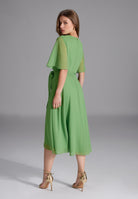 Chiffon Kleid in Wickel Optik mit Vokuhila Saum