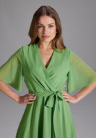 Chiffon Kleid in Wickel Optik mit Vokuhila Saum