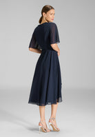 Chiffon Kleid in Wickel Optik mit Vokuhila Saum